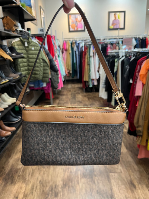 Vist Large View of Product Image Which is Used Michael Michael Kors Wristlet