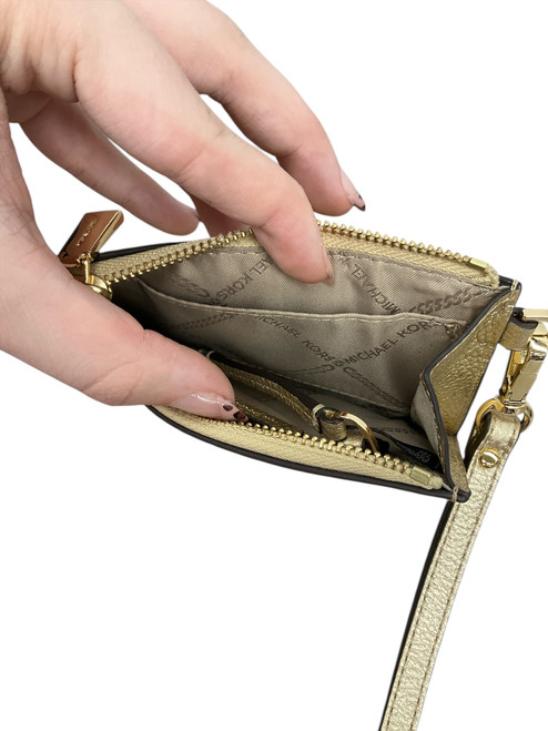 Vist Large View of Product Image Which is Used MichaelKors Leather Wristlet