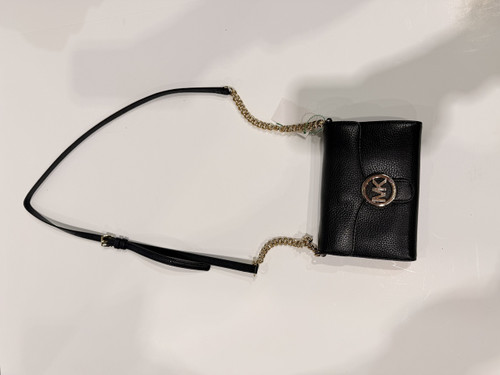 Vist Large View of Product Image Which is Used Michael Michael Kors Leather Wristlet