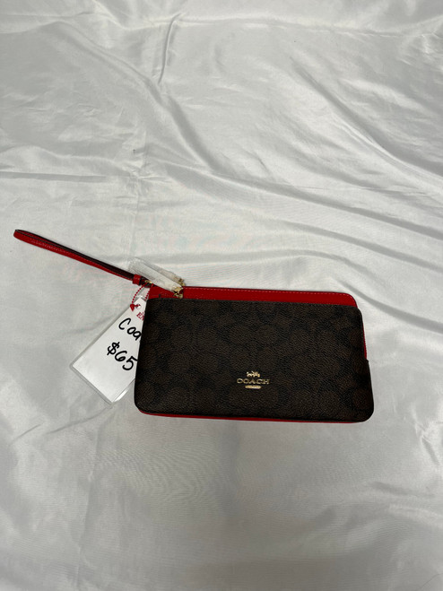 Vist Large View of Product Image Which is Used Coach Leather Wristlet
