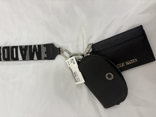 Vist Large View of Product Image Which is Used Steve Madden Leather Wristlet