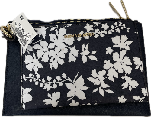 Vist Large View of Product Image Which is Used Michael Michael Kors Wristlet