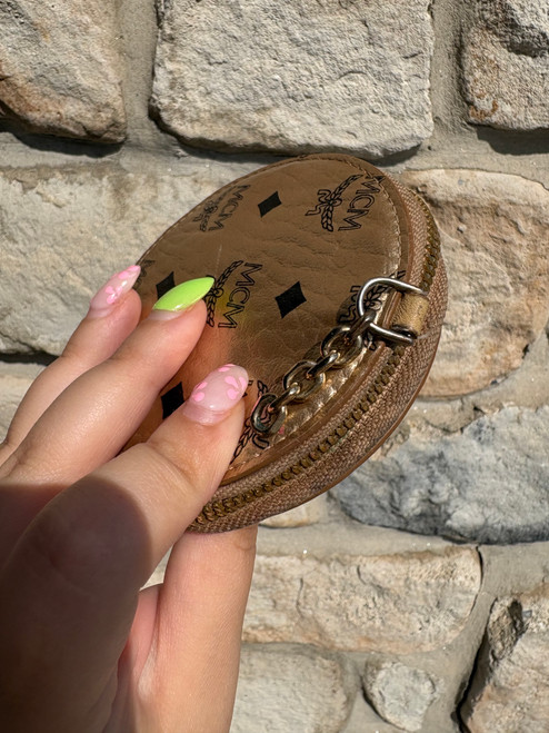 Vist Large View of Product Image Which is Used MCM Munchen Pouch