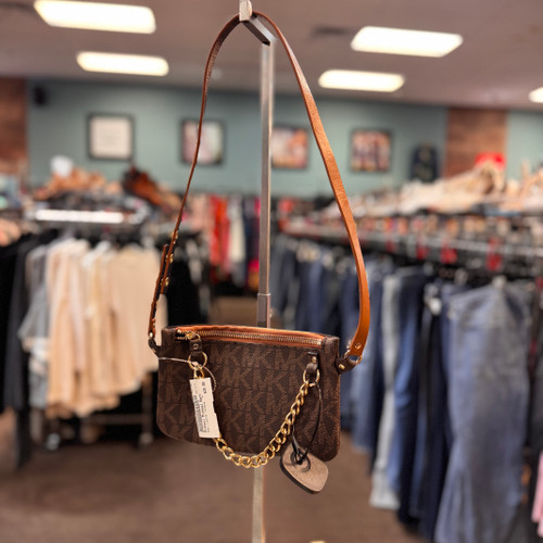 Vist Large View of Product Image Which is Used Michael Michael Kors Leather Wristlet