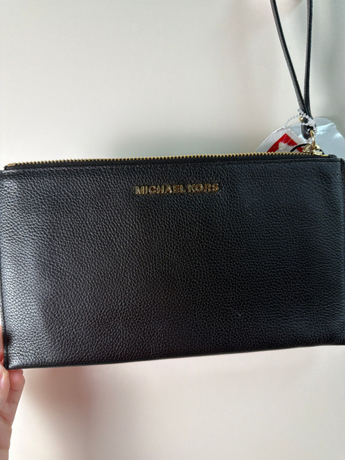 Vist Large View of Product Image Which is Used Michael Michael Kors Leather Wristlet