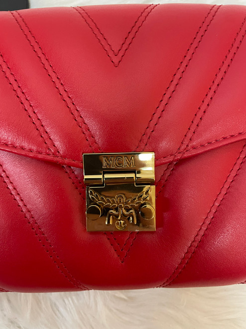 Used MCM Munchen Small Leather Handbag 60053-S000598396 Vist Large View of Product Image Which is Used MCM Munchen Small Leather Handbag