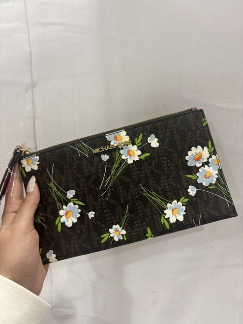 Vist Large View of Product Image Which is Used Michael Michael Kors Leather Wristlet