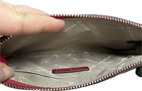 Vist Large View of Product Image Which is Used Michael Michael Kors Leather Wristlet