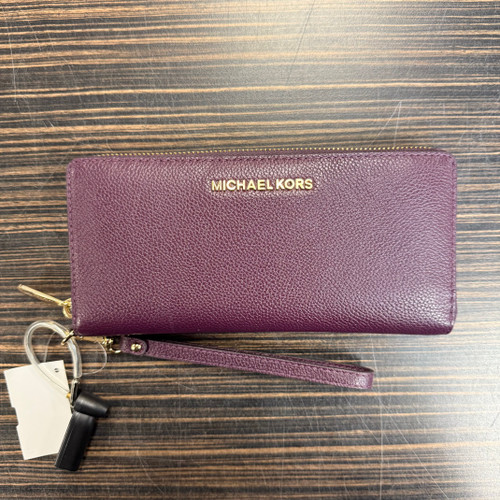 Vist Large View of Product Image Which is Used Michael Michael Kors Leather Wristlet