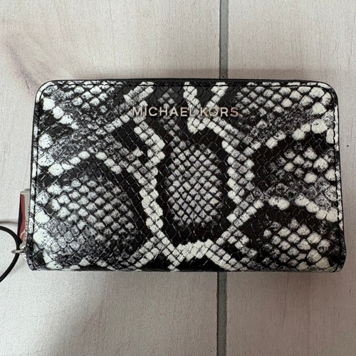 Vist Large View of Product Image Which is Used Michael Michael Kors Leather Wallet