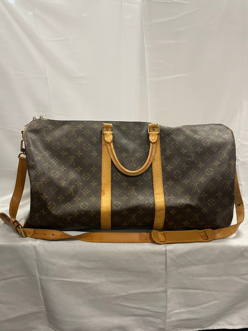 Vist Large View of Product Image Which is Used Louis Vuitton duffel  Xlarge Leather Handbag