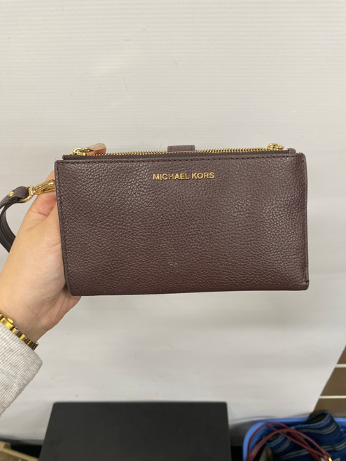 Vist Large View of Product Image Which is Used Michael Michael Kors Leather Wristlet