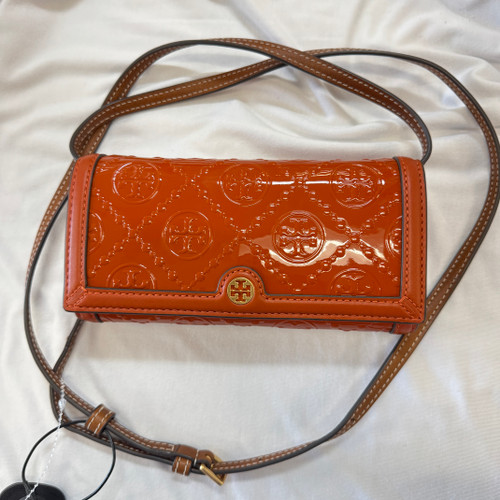 Vist Large View of Product Image Which is Used Tory Burch Small Leather Handbag