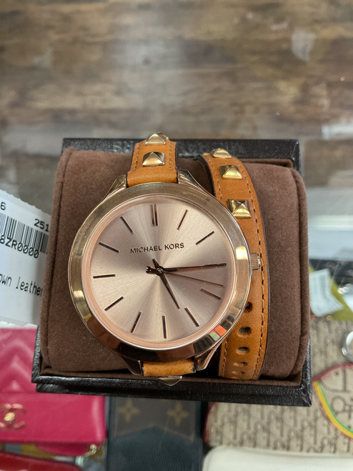 Vist Large View of Product Image Which is Used Micheal  Kors Watch