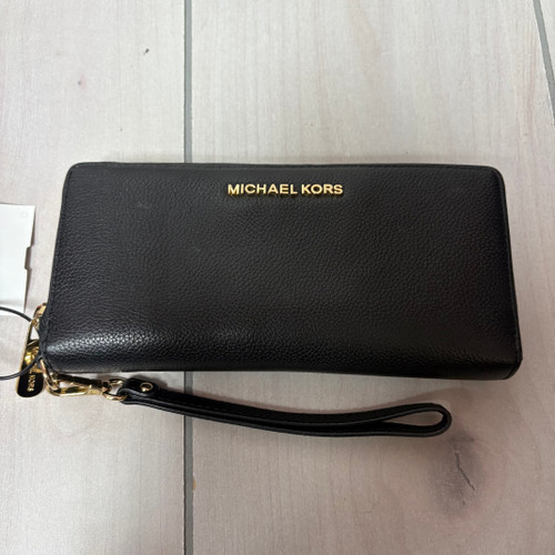 Vist Large View of Product Image Which is Used Michael Kors Leather Wristlet