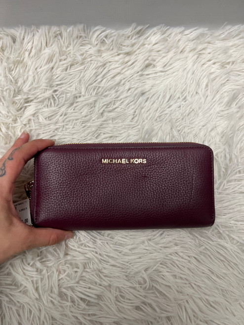 Vist Large View of Product Image Which is Used Michael Michael Kors Leather Wristlet