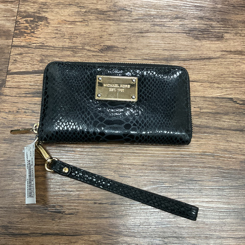 Vist Large View of Product Image Which is Used Michael Michael Kors Leather Wristlet