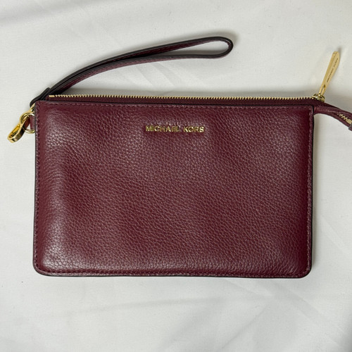 Vist Large View of Product Image Which is Used Michael Michael Kors Leather Wristlet