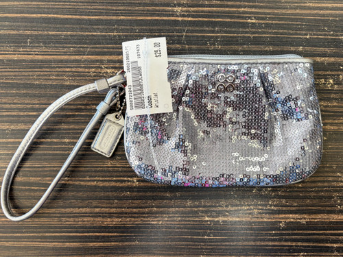 Vist Large View of Product Image Which is Used Coach Wristlet