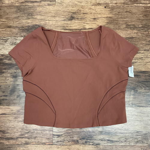 Vist Large View of Product Image Which is Used Lululemon Athletica Active Short Sleeve L-12/14