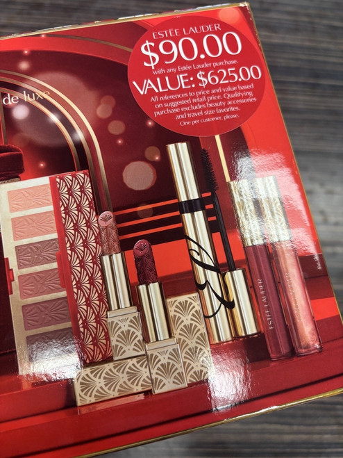 Vist Large View of Product Image Which is New Estée Lauder make up with bag