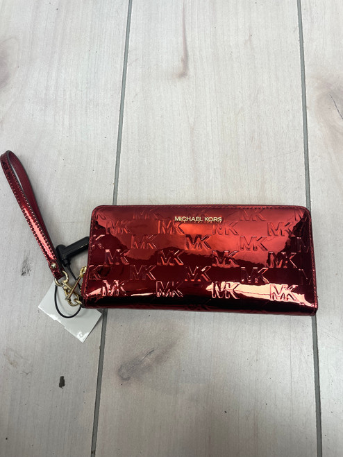 Vist Large View of Product Image Which is Used Michael Michael Kors Wristlet