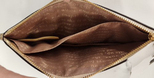 Vist Large View of Product Image Which is Used Kate Spade New York Wristlet