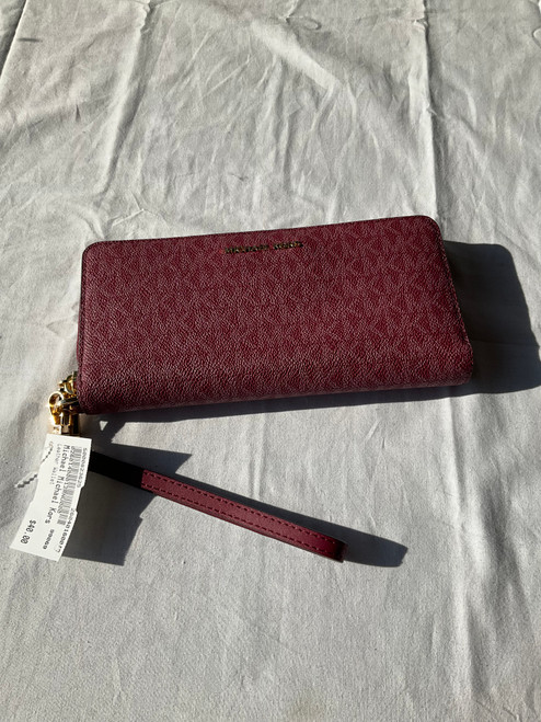 Vist Large View of Product Image Which is Used Michael Michael Kors Leather Wallet