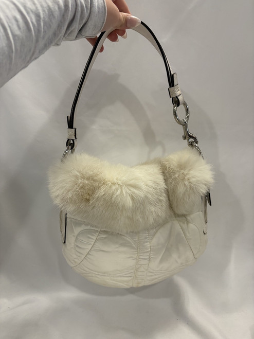 Vist Large View of Product Image Which is Used Coach fur Large Handbag