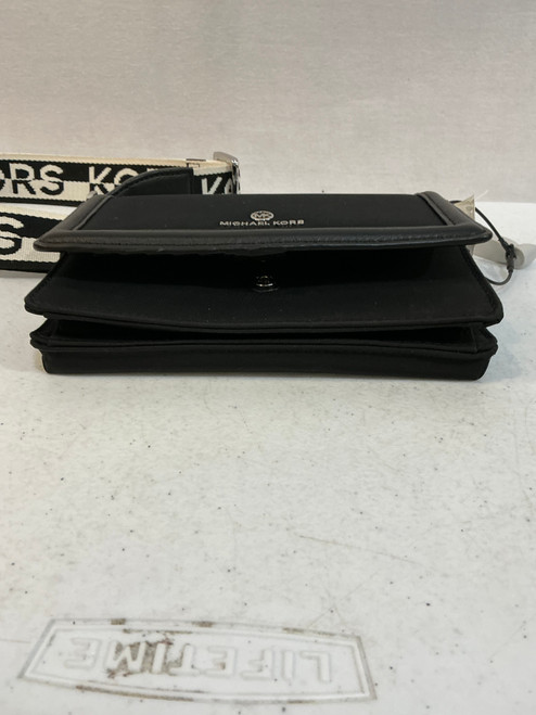 Vist Large View of Product Image Which is Used Michael Kors Large Handbag