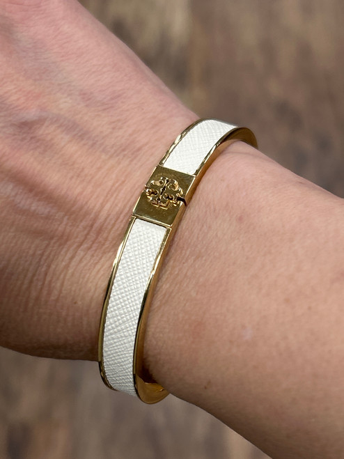 Vist Large View of Product Image Which is Used Tory Burch white and gold Bracelet