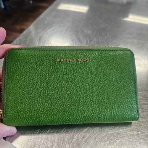Vist Large View of Product Image Which is Used Michael Michael Kors Wristlet