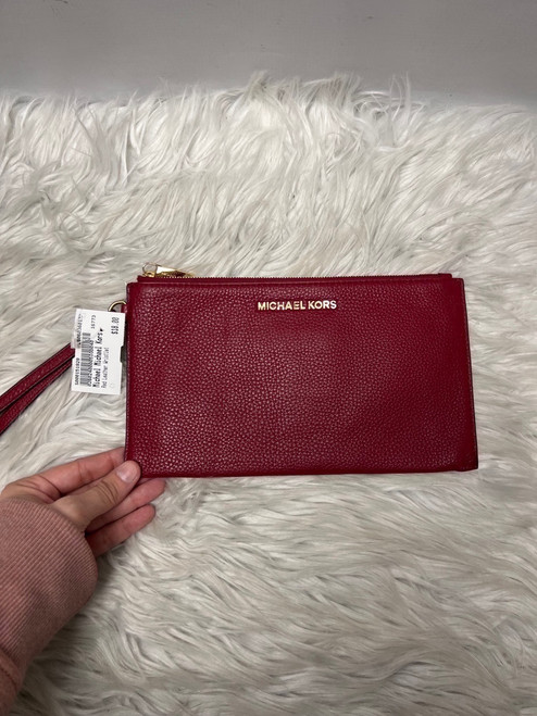 Vist Large View of Product Image Which is Used Michael Michael Kors Leather Wristlet