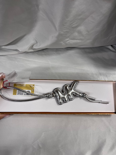Vist Large View of Product Image Which is Used Michael Michael Kors Charm