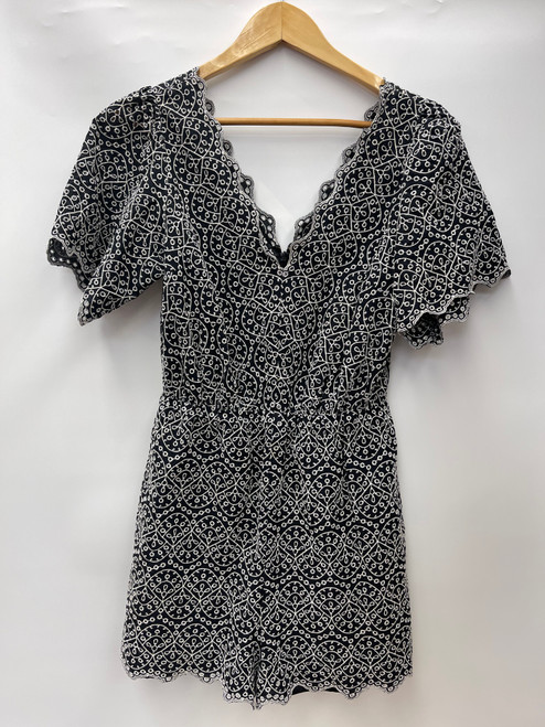 Vist Large View of Product Image Which is Used Express Romper S-4/6