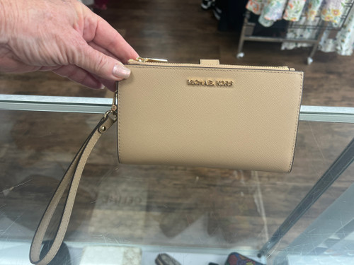 Vist Large View of Product Image Which is Used Michael Michael Kors Wristlet