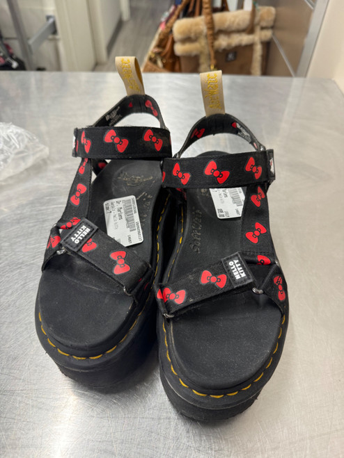 Vist Large View of Product Image Which is Used black hello kitty Dr. Martens Sandals 7