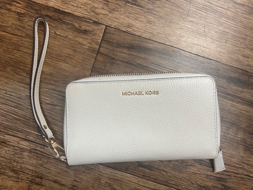 Vist Large View of Product Image Which is Used Michael Michael Kors Leather Wristlet