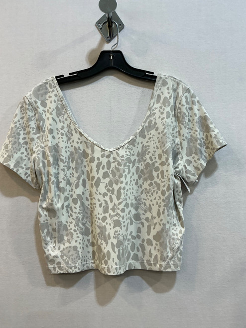 Vist Large View of Product Image Which is Used Lululemon Athletica Active Short Sleeve L-12/14