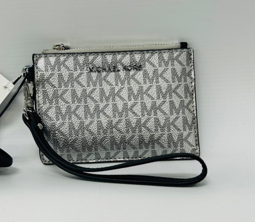 Vist Large View of Product Image Which is Used Michael Michael Kors Leather Wristlet