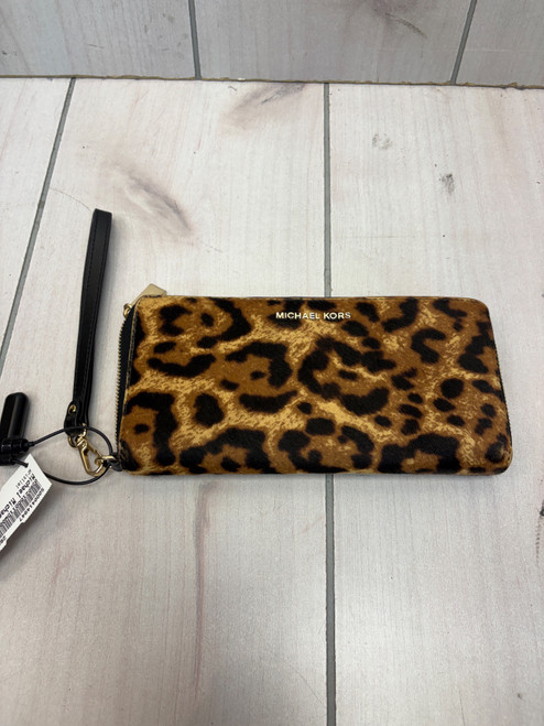Vist Large View of Product Image Which is Used Michael Michael Kors Wristlet