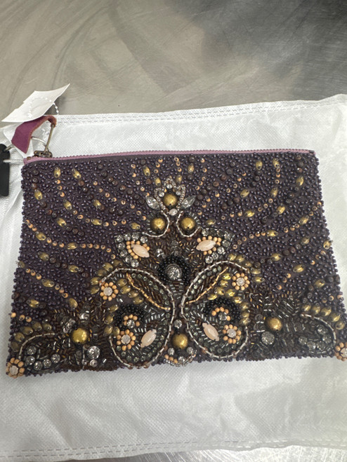 Vist Large View of Product Image Which is Used Purple Anthropologie Wristlet