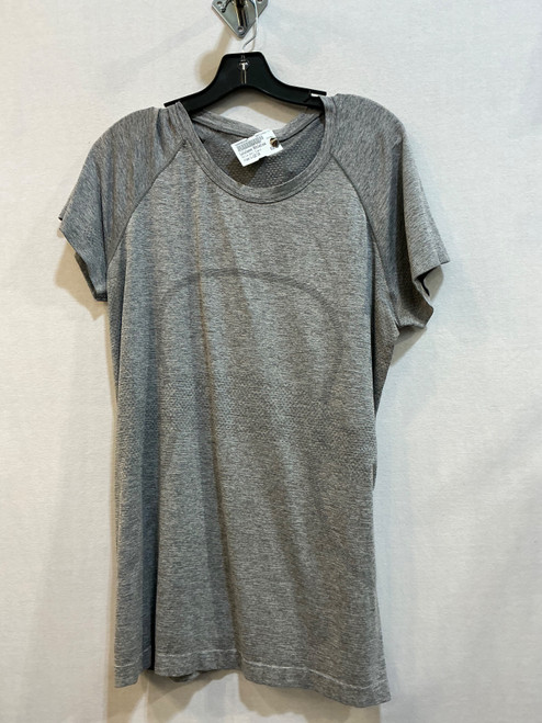 Vist Large View of Product Image Which is Used Lululemon Athletica Active Short Sleeve L-12/14