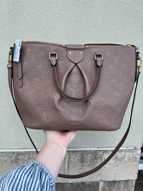 Vist Large View of Product Image Which is Used Authentic Louis Vuitton Montaigne MM Monogram Empreinte Leather Galet Taupe Crossbody Tote