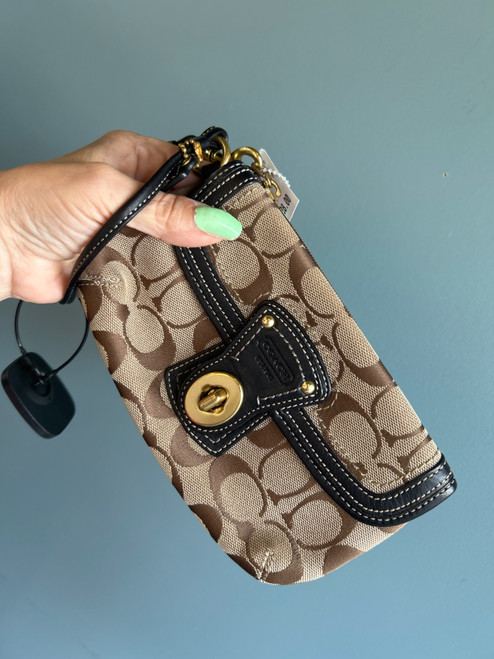 Vist Large View of Product Image Which is Used Coach Leather Wristlet