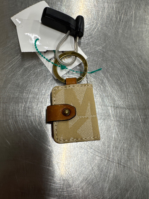 Vist Large View of Product Image Which is Used brown Michael Kors purse charm 