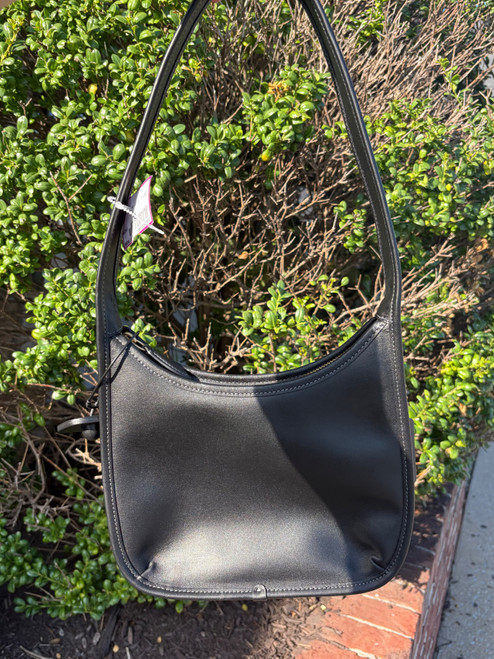 Vist Large View of Product Image Which is Used coach curve zip Small Leather Handbag