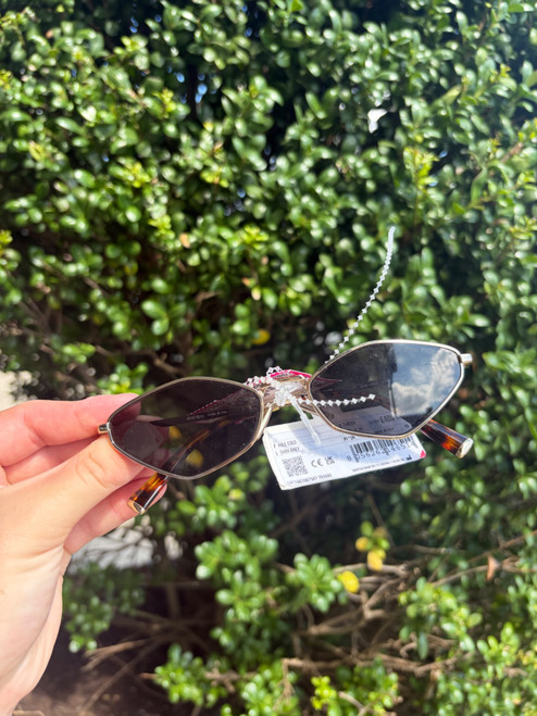 Vist Large View of Product Image Which is Used miumiu sunglasses 