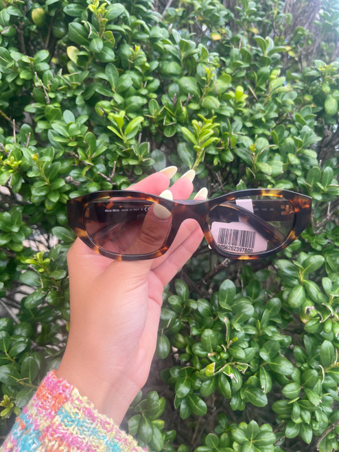 Vist Large View of Product Image Which is Used Miu Miu Sunglasses
