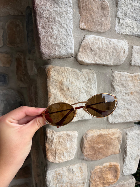 Vist Large View of Product Image Which is Used Miu Miu round gold sunglasses